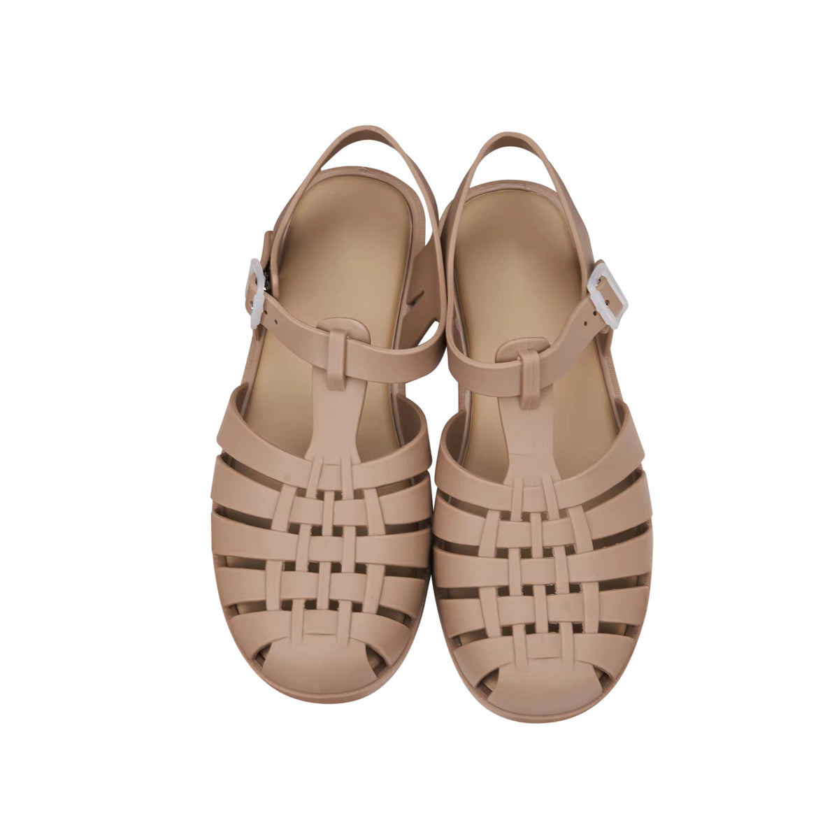 The Camel Bubble Jelly Shoe has an adjustable single strap with a grip sole, named for its soft cushioning. The waterproof sandal is pared back and versatile — a perfect addition to the summer wardrobe.